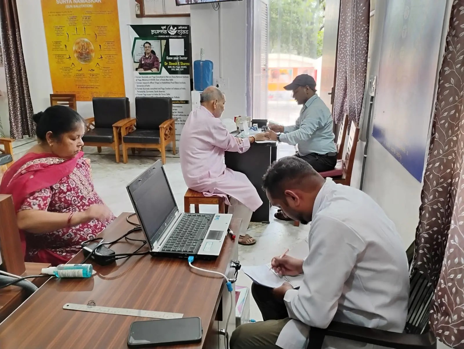 Health checks and registration inside the Purna Ojas clinic